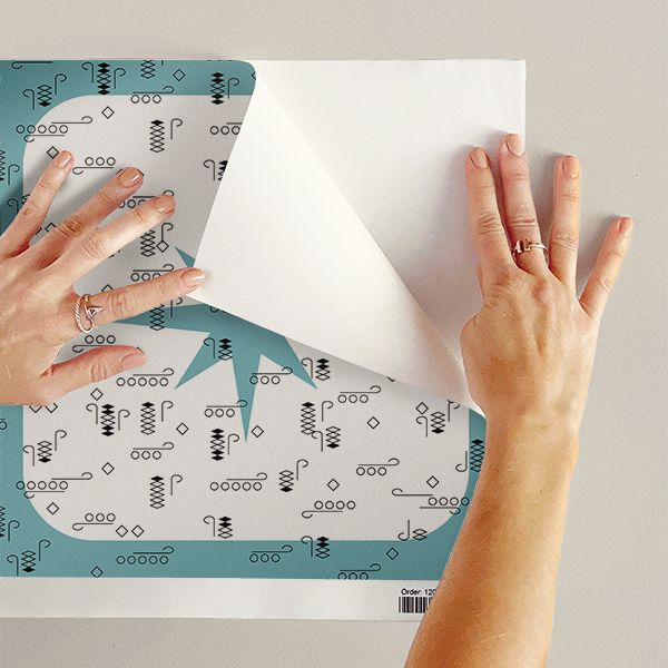 The artwork features a repeating geometric pattern of symmetrical shapes resembling elongated, curved diamonds or petals in various shades of blue and green. Each shape is split vertically with one half filled with a light blue and the other half filled with green or darker blue. The background is a light, almost pastel blue, which provides a soft yet vibrant backdrop. One of the blue shapes near the upper left contains a white starburst element, adding a focal point of brightness to the composition. The overall design conveys a modern, mid-century aesthetic with clean lines and harmonious color contrasts.